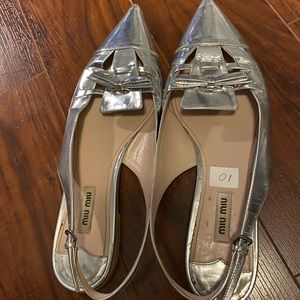 Miumiu Authentic silver Flats size 10